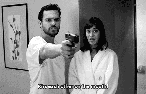 Kiss each other on the mouth! (Pointing a gun)